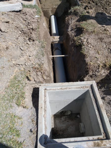 300mm stormwater to council main , dodging existing services 